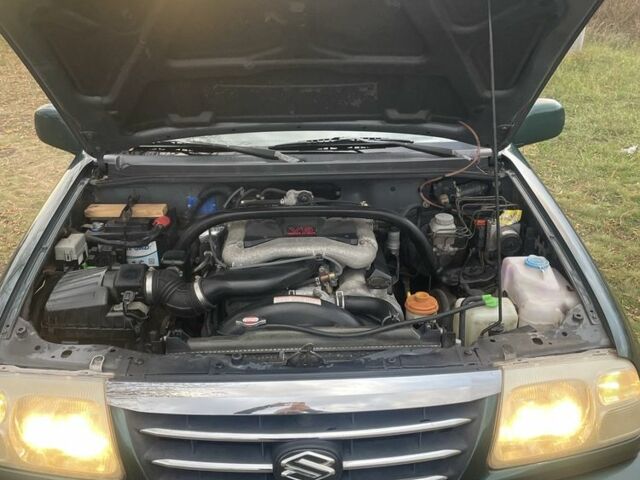 Зелений Сузукі Гранд Вітара, об'ємом двигуна 2.7 л та пробігом 184 тис. км за 3600 $, фото 8 на Automoto.ua