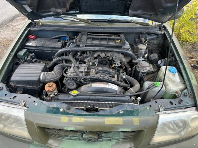 Зелений Сузукі Гранд Вітара, об'ємом двигуна 2 л та пробігом 300 тис. км за 2500 $, фото 2 на Automoto.ua