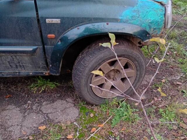 Зелений Сузукі Гранд Вітара, об'ємом двигуна 2.5 л та пробігом 2 тис. км за 1000 $, фото 2 на Automoto.ua