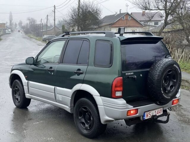 Зелений Сузукі Гранд Вітара, об'ємом двигуна 2 л та пробігом 280 тис. км за 2799 $, фото 2 на Automoto.ua