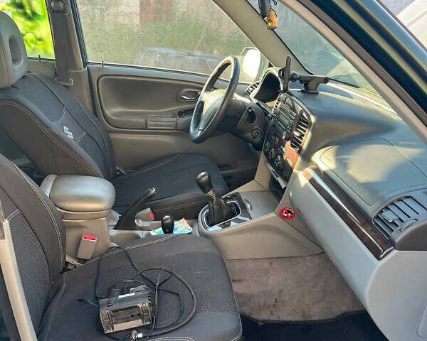 Зелений Сузукі Гранд Вітара, об'ємом двигуна 2 л та пробігом 312 тис. км за 3200 $, фото 5 на Automoto.ua