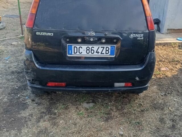 Чорний Сузукі Ігніс, об'ємом двигуна 1.5 л та пробігом 200 тис. км за 1400 $, фото 11 на Automoto.ua