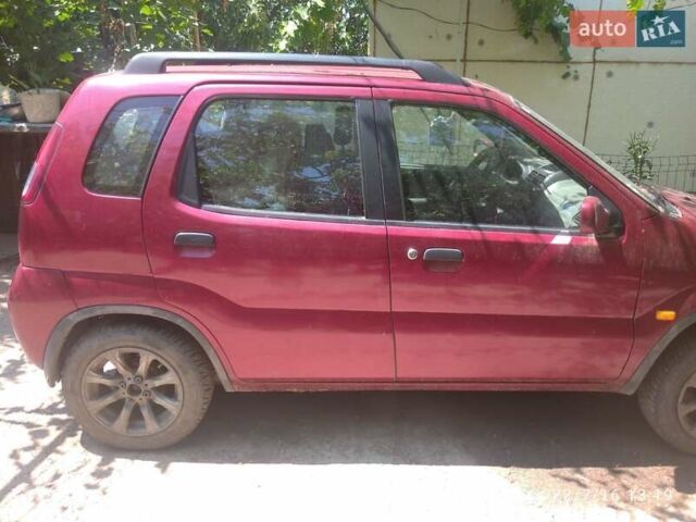 Красный Сузуки Игнис, объемом двигателя 1.33 л и пробегом 320 тыс. км за 1900 $, фото 11 на Automoto.ua