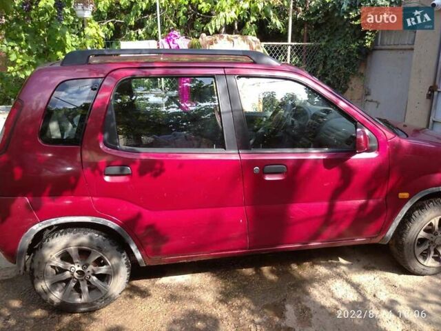 Красный Сузуки Игнис, объемом двигателя 1.33 л и пробегом 320 тыс. км за 1900 $, фото 2 на Automoto.ua