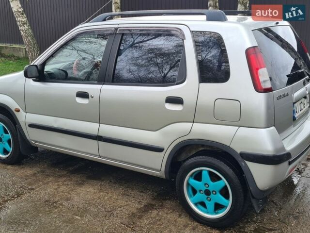 Серый Сузуки Игнис, объемом двигателя 1.3 л и пробегом 243 тыс. км за 4200 $, фото 7 на Automoto.ua