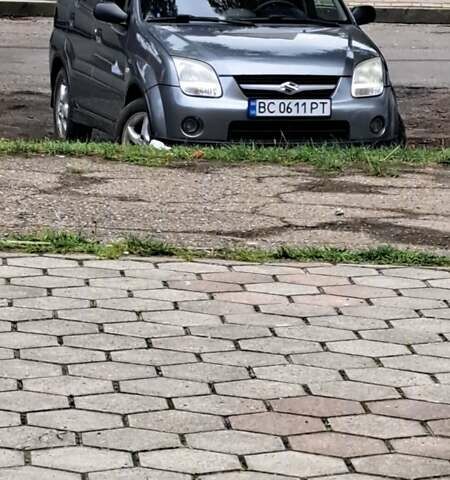 Серый Сузуки Игнис, объемом двигателя 1.3 л и пробегом 199 тыс. км за 4200 $, фото 1 на Automoto.ua