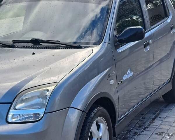 Серый Сузуки Игнис, объемом двигателя 1.3 л и пробегом 199 тыс. км за 4200 $, фото 2 на Automoto.ua