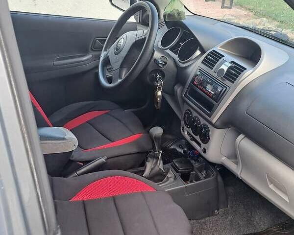 Серый Сузуки Игнис, объемом двигателя 1.3 л и пробегом 199 тыс. км за 4200 $, фото 6 на Automoto.ua