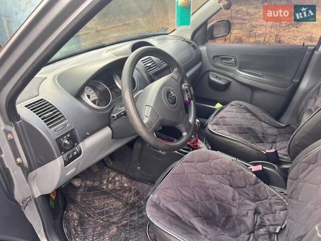 Серый Сузуки Игнис, объемом двигателя 1.25 л и пробегом 383 тыс. км за 4750 $, фото 8 на Automoto.ua
