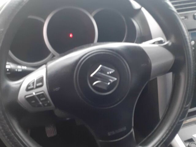 Серый Сузуки Игнис, объемом двигателя 1.9 л и пробегом 250 тыс. км за 8300 $, фото 4 на Automoto.ua