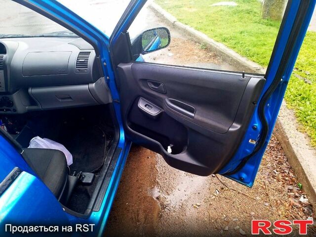 Синий Сузуки Игнис, объемом двигателя 1.5 л и пробегом 200 тыс. км за 5500 $, фото 2 на Automoto.ua