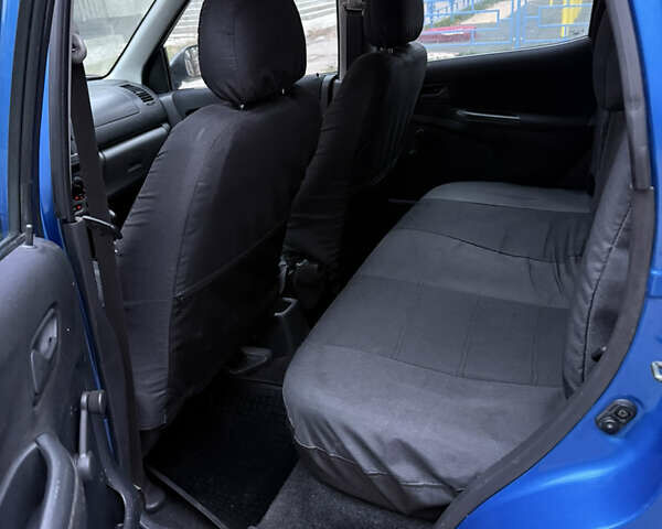 Синий Сузуки Игнис, объемом двигателя 1.3 л и пробегом 282 тыс. км за 4100 $, фото 4 на Automoto.ua