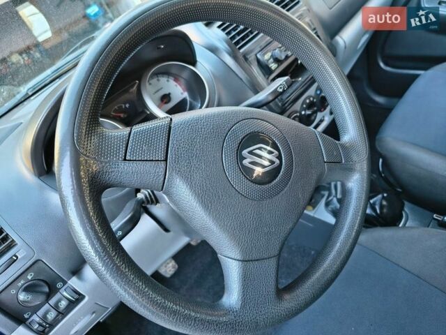 Синий Сузуки Игнис, объемом двигателя 1.49 л и пробегом 237 тыс. км за 4450 $, фото 42 на Automoto.ua