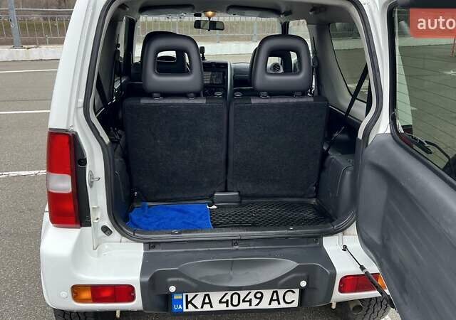 Белый Сузуки Джимни, объемом двигателя 1.3 л и пробегом 81 тыс. км за 9300 $, фото 9 на Automoto.ua