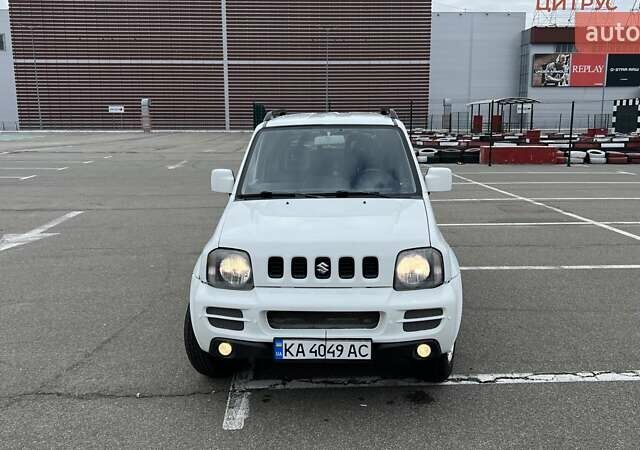 Белый Сузуки Джимни, объемом двигателя 1.3 л и пробегом 81 тыс. км за 9300 $, фото 7 на Automoto.ua