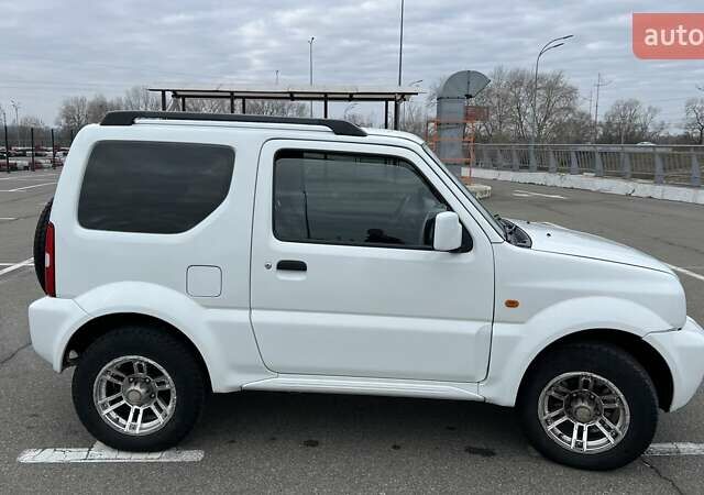 Белый Сузуки Джимни, объемом двигателя 1.3 л и пробегом 81 тыс. км за 9300 $, фото 5 на Automoto.ua