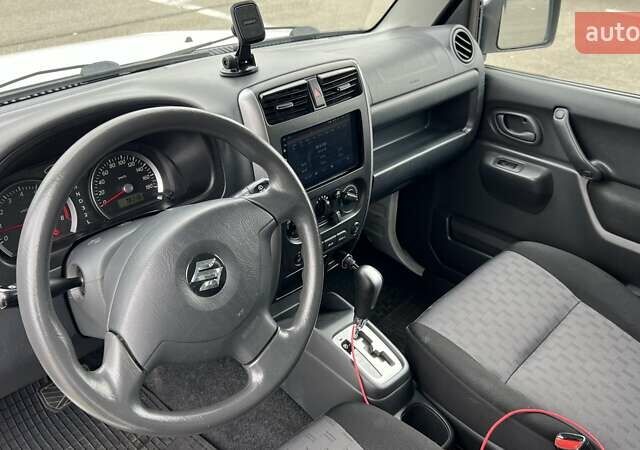 Белый Сузуки Джимни, объемом двигателя 1.3 л и пробегом 81 тыс. км за 9300 $, фото 11 на Automoto.ua