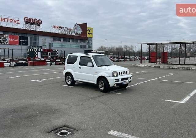 Белый Сузуки Джимни, объемом двигателя 1.3 л и пробегом 81 тыс. км за 9300 $, фото 8 на Automoto.ua