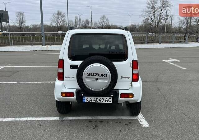 Белый Сузуки Джимни, объемом двигателя 1.3 л и пробегом 81 тыс. км за 9300 $, фото 3 на Automoto.ua