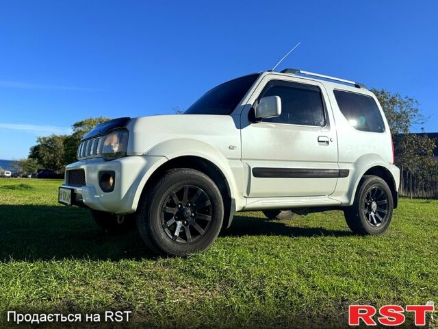 Сузуки Джимни 2012 в Черноморске (Ильичевске) на Automoto.ua Белый Сузуки Джимни, объемом двигателя 1.3 л и пробегом 70 тыс. км за 13400 $, фото 3 на Automoto.ua