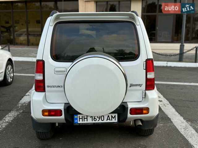 Белый Сузуки Джимни, объемом двигателя 1.33 л и пробегом 87 тыс. км за 13800 $, фото 5 на Automoto.ua