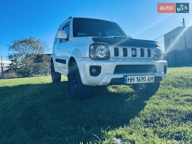 Белый Сузуки Джимни, объемом двигателя 1.33 л и пробегом 87 тыс. км за 13800 $, фото 15 на Automoto.ua