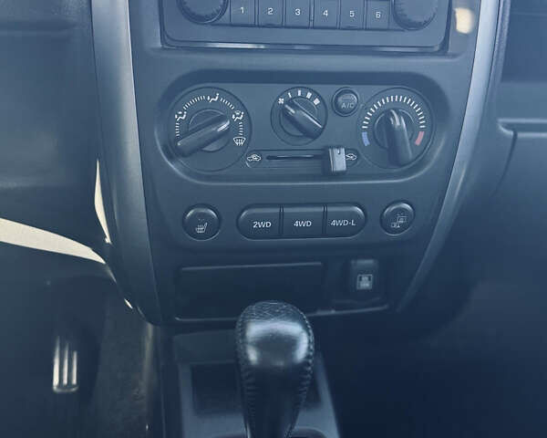 Белый Сузуки Джимни, объемом двигателя 1.33 л и пробегом 87 тыс. км за 13800 $, фото 11 на Automoto.ua