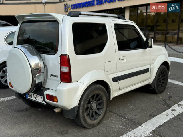Білий Сузукі Джімні, об'ємом двигуна 1.33 л та пробігом 72 тис. км за 13400 $, фото 29 на Automoto.ua