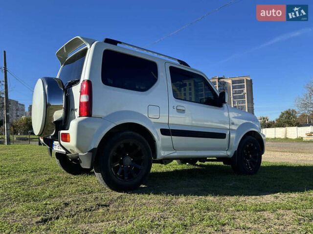 Білий Сузукі Джімні, об'ємом двигуна 1.33 л та пробігом 72 тис. км за 13400 $, фото 13 на Automoto.ua