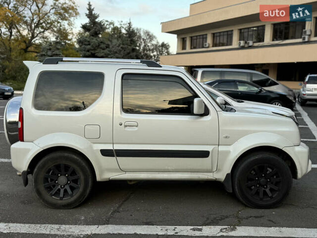 Білий Сузукі Джімні, об'ємом двигуна 1.33 л та пробігом 72 тис. км за 13400 $, фото 28 на Automoto.ua
