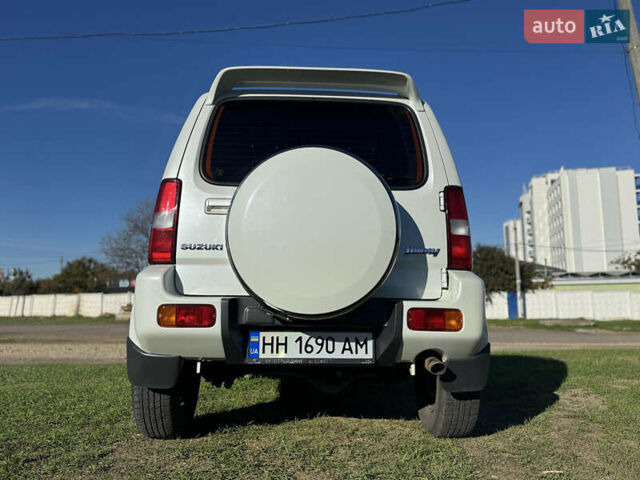 Білий Сузукі Джімні, об'ємом двигуна 1.33 л та пробігом 72 тис. км за 13400 $, фото 7 на Automoto.ua