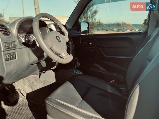 Білий Сузукі Джімні, об'ємом двигуна 1.33 л та пробігом 72 тис. км за 13400 $, фото 16 на Automoto.ua