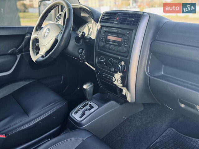 Білий Сузукі Джімні, об'ємом двигуна 1.33 л та пробігом 72 тис. км за 13400 $, фото 15 на Automoto.ua