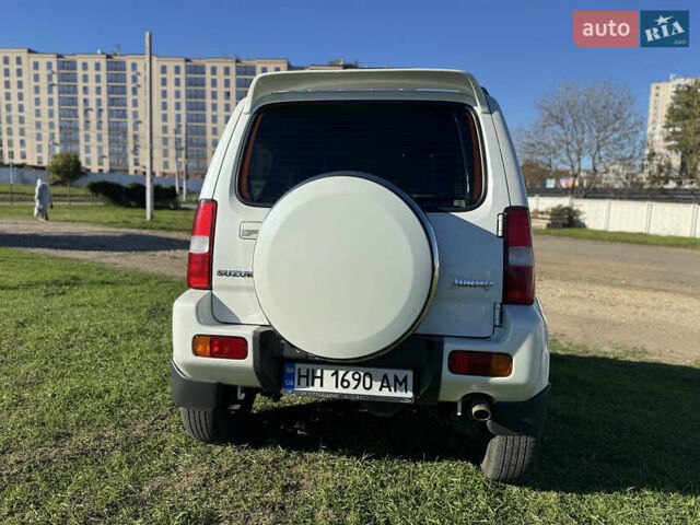 Білий Сузукі Джімні, об'ємом двигуна 1.33 л та пробігом 72 тис. км за 13400 $, фото 4 на Automoto.ua