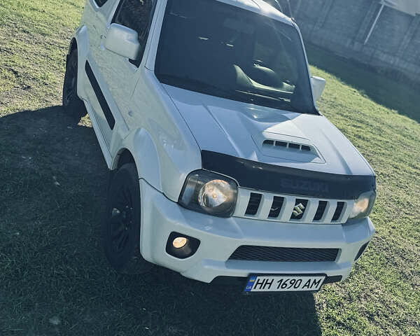 Білий Сузукі Джімні, об'ємом двигуна 1.33 л та пробігом 72 тис. км за 13400 $, фото 2 на Automoto.ua