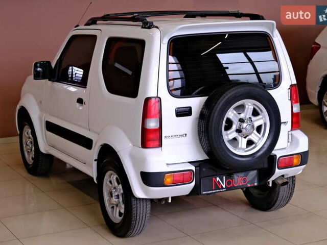Білий Сузукі Джімні, об'ємом двигуна 1.3 л та пробігом 122 тис. км за 14900 $, фото 14 на Automoto.ua