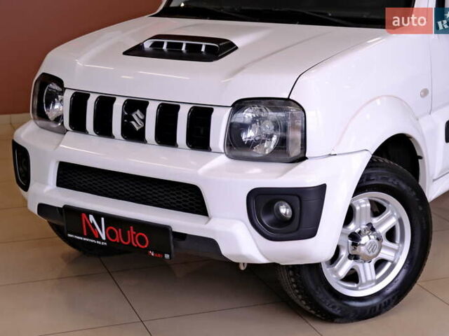 Білий Сузукі Джімні, об'ємом двигуна 1.3 л та пробігом 122 тис. км за 14900 $, фото 10 на Automoto.ua