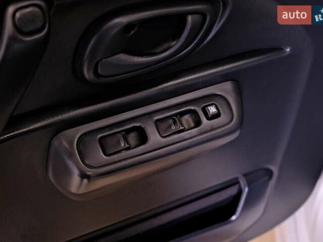 Білий Сузукі Джімні, об'ємом двигуна 1.3 л та пробігом 122 тис. км за 14900 $, фото 16 на Automoto.ua