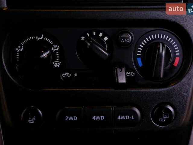 Білий Сузукі Джімні, об'ємом двигуна 1.3 л та пробігом 122 тис. км за 14900 $, фото 22 на Automoto.ua