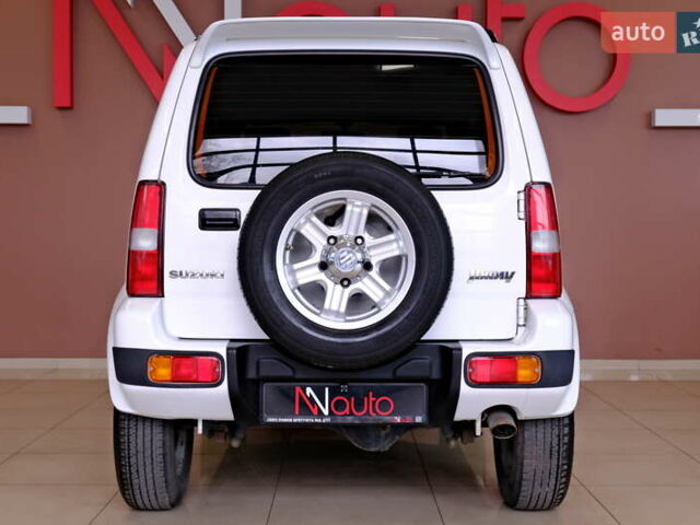 Білий Сузукі Джімні, об'ємом двигуна 1.3 л та пробігом 122 тис. км за 14900 $, фото 12 на Automoto.ua