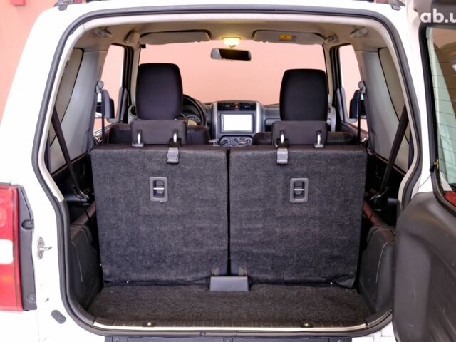 Белый Сузуки Джимни, объемом двигателя 1.3 л и пробегом 122 тыс. км за 14900 $, фото 8 на Automoto.ua