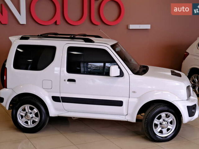 Білий Сузукі Джімні, об'ємом двигуна 1.3 л та пробігом 122 тис. км за 14900 $, фото 7 на Automoto.ua