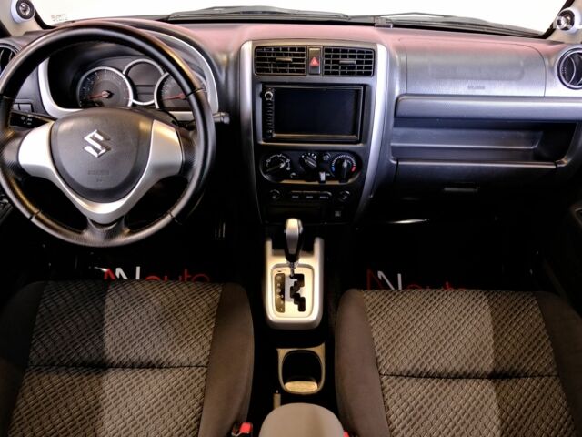 Белый Сузуки Джимни, объемом двигателя 1.3 л и пробегом 122 тыс. км за 14900 $, фото 6 на Automoto.ua