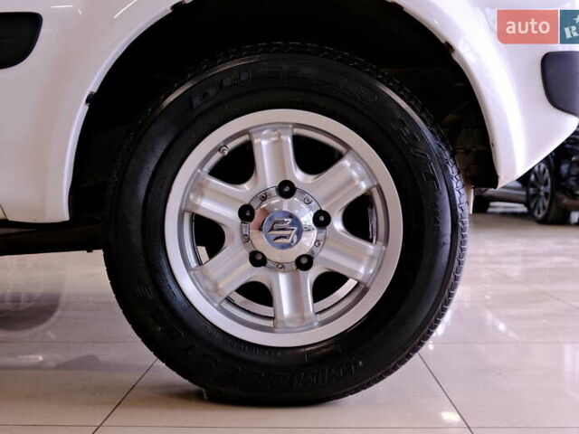 Білий Сузукі Джімні, об'ємом двигуна 1.3 л та пробігом 122 тис. км за 14900 $, фото 15 на Automoto.ua