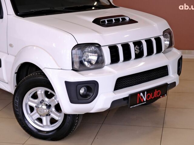 Белый Сузуки Джимни, объемом двигателя 1.3 л и пробегом 122 тыс. км за 14900 $, фото 3 на Automoto.ua