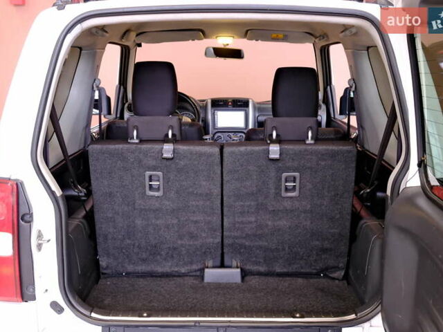 Білий Сузукі Джімні, об'ємом двигуна 1.3 л та пробігом 122 тис. км за 14900 $, фото 38 на Automoto.ua