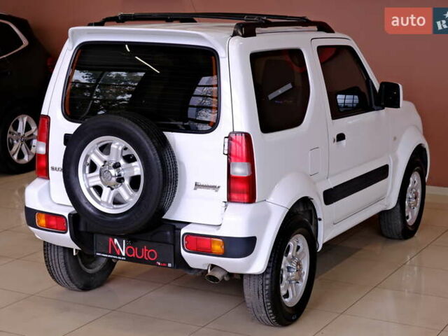 Білий Сузукі Джімні, об'ємом двигуна 1.3 л та пробігом 122 тис. км за 14900 $, фото 13 на Automoto.ua