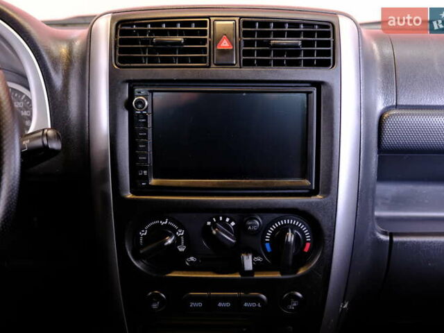 Білий Сузукі Джімні, об'ємом двигуна 1.3 л та пробігом 122 тис. км за 14900 $, фото 36 на Automoto.ua