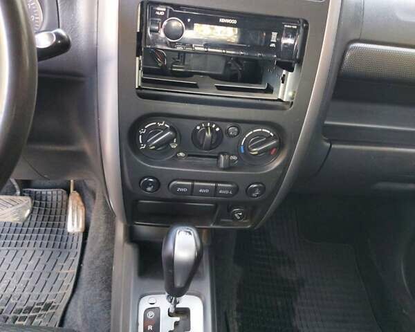 Бежевий Сузукі Джімні, об'ємом двигуна 1.6 л та пробігом 186 тис. км за 9200 $, фото 13 на Automoto.ua