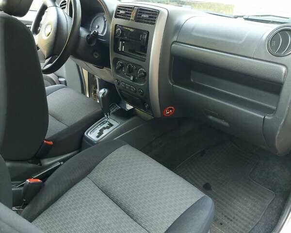 Бежевий Сузукі Джімні, об'ємом двигуна 1.6 л та пробігом 186 тис. км за 9200 $, фото 12 на Automoto.ua